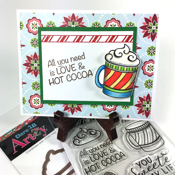 This clear stamp set is perfect for the hot chocolate lover. Stamp the striped border in red for a touch of peppermint.  The die that matches this set cuts out the mug, steam and whipped topping. By Dare 2B Artzy.