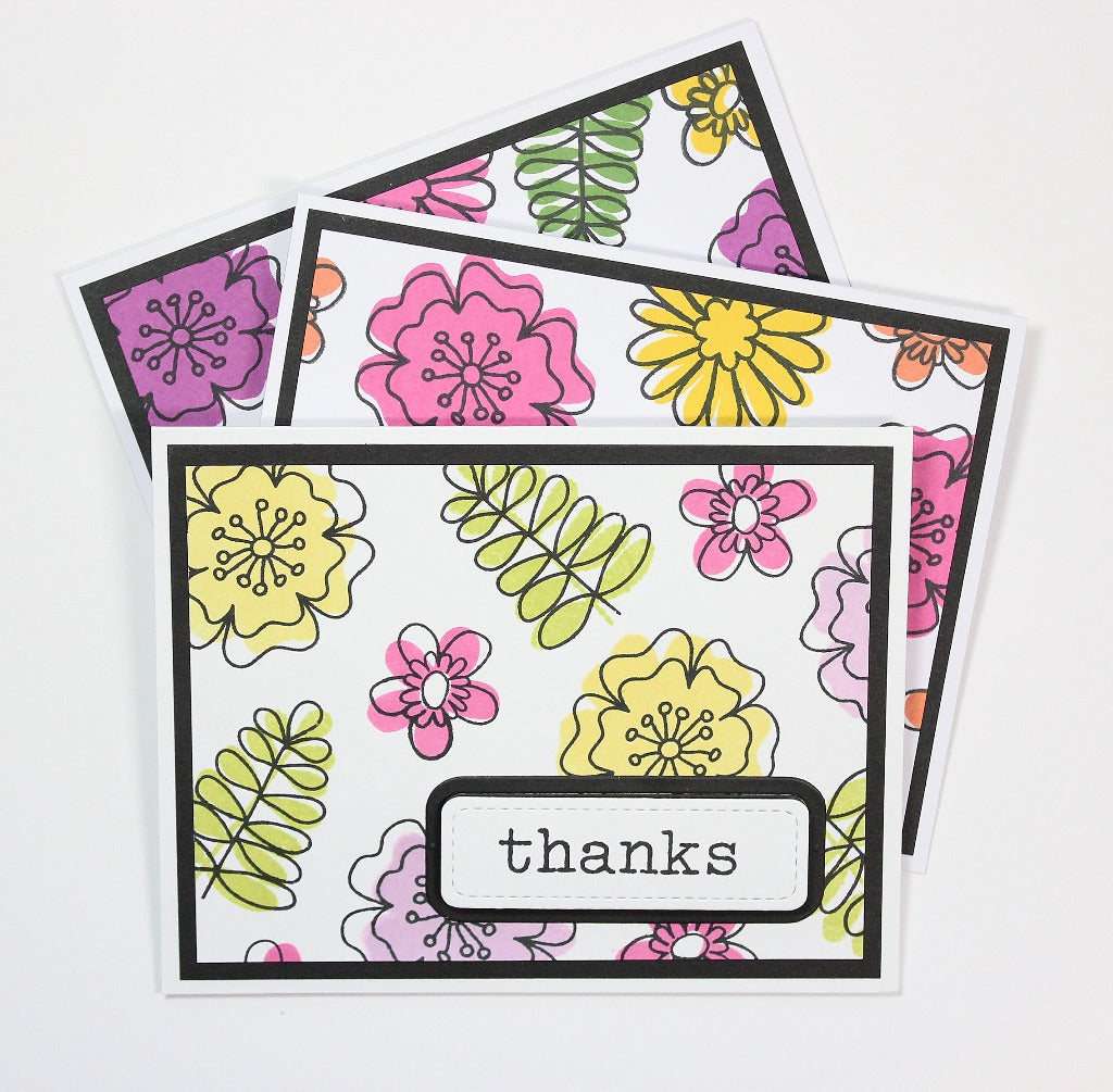 Flowers, flowers, and more flowers. Color in the outlined flowers or combine the solid and outlined flowers for a fun layered look. There are so many ways to use these flowers.  These clear stamp flowers also coordinate with our Fields of Joy paper line. By Dare 2B Artzy.
