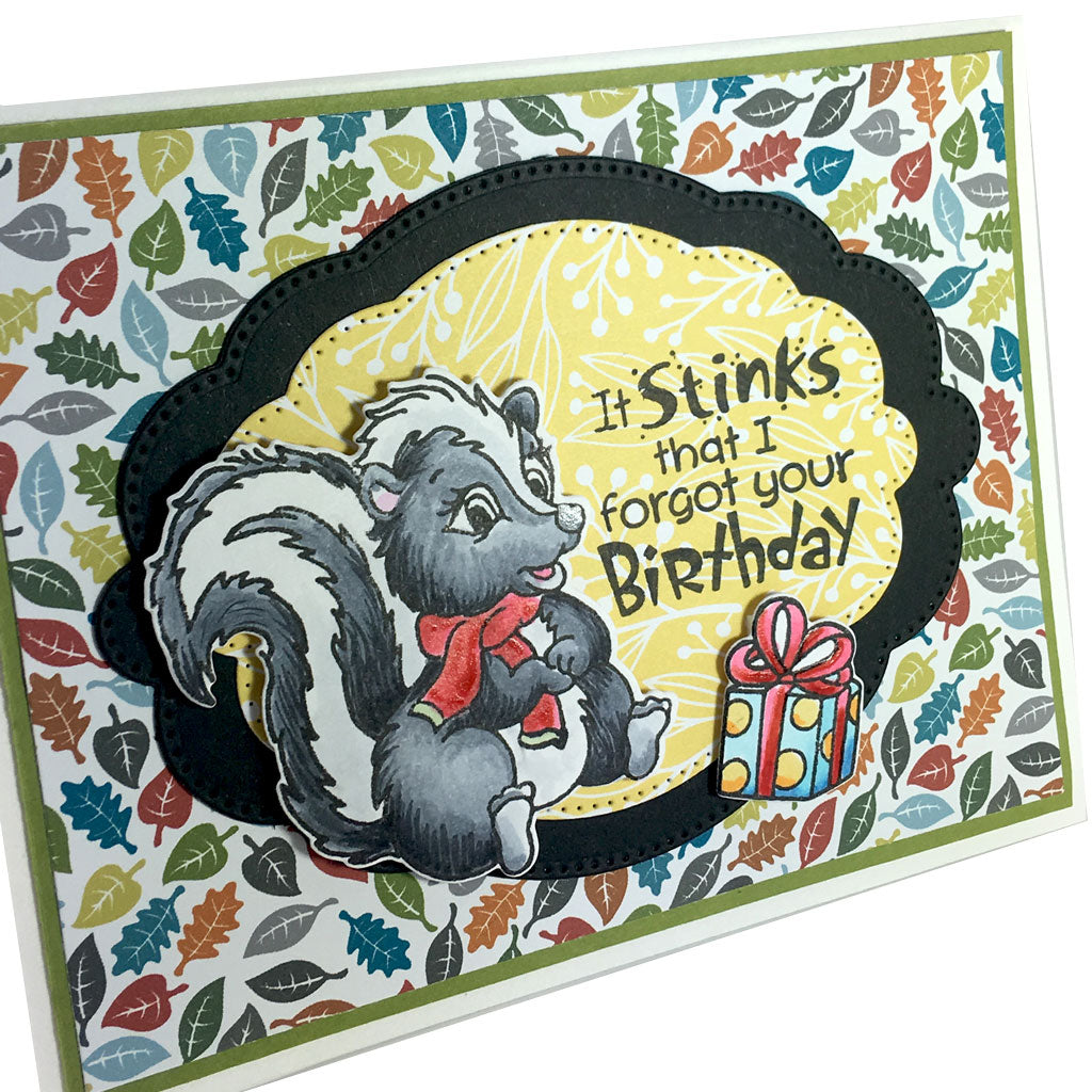 One of two of our stinkin' adorable skunk stamp sets. Both use the same coordinating die.  We have added a fun little scarf, gift, flower and even smelly swirls to give you plenty of options. By Dare 2B Artzy. 