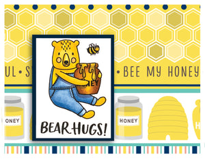Handmade card with a bear holding a honey jar and the sentiment, "Bear hugs". Uses the stamp set and die cut, "Honey Bears" from Dare 2B Artzy.