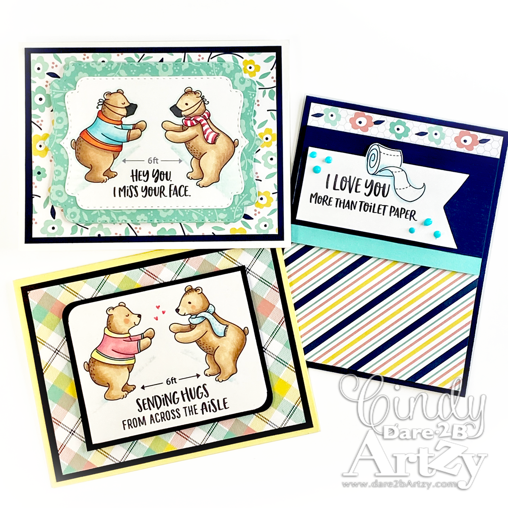 Three handmade cards with bears reaching for a hug with masks on and standing 6 feet apart from each other.  Uses stamp set and die cut, "Bear Hugs" from Dare 2B Artzy.