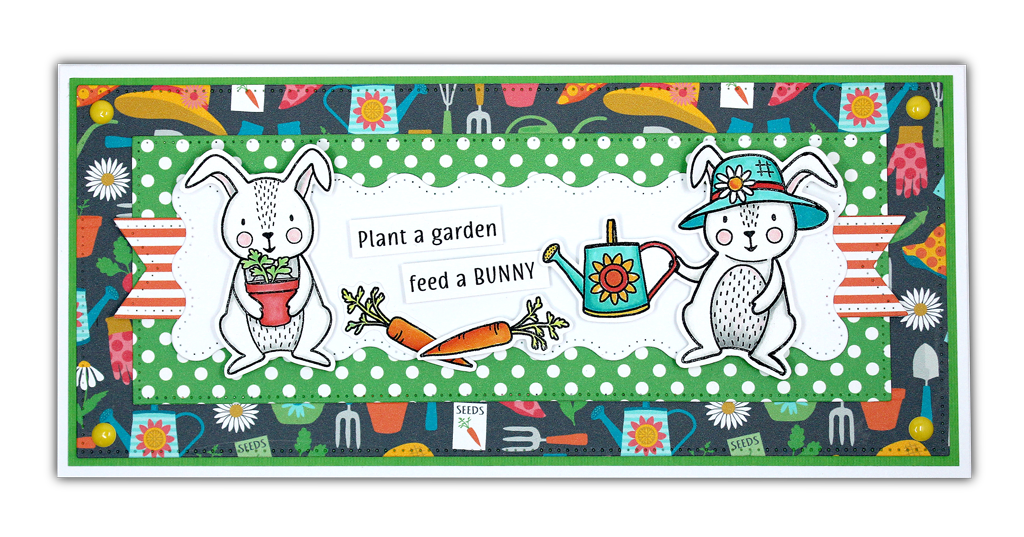 Homemade card using the stamp set and die, "Honey Bunny" from Dare 2B Artzy. The card has an image of two adorable bunnies gardening and the sentiment, "Plant a garden, feed a bunny".