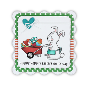 Handmade card using the stamp set and die, "Hippity Hoppity" from Dare 2B Artzy. Card includes an image of a bunny pushing a wheelbarrow full of Easter eggs, and the sentiment "Hippity Hoppity Easter's on it's way".