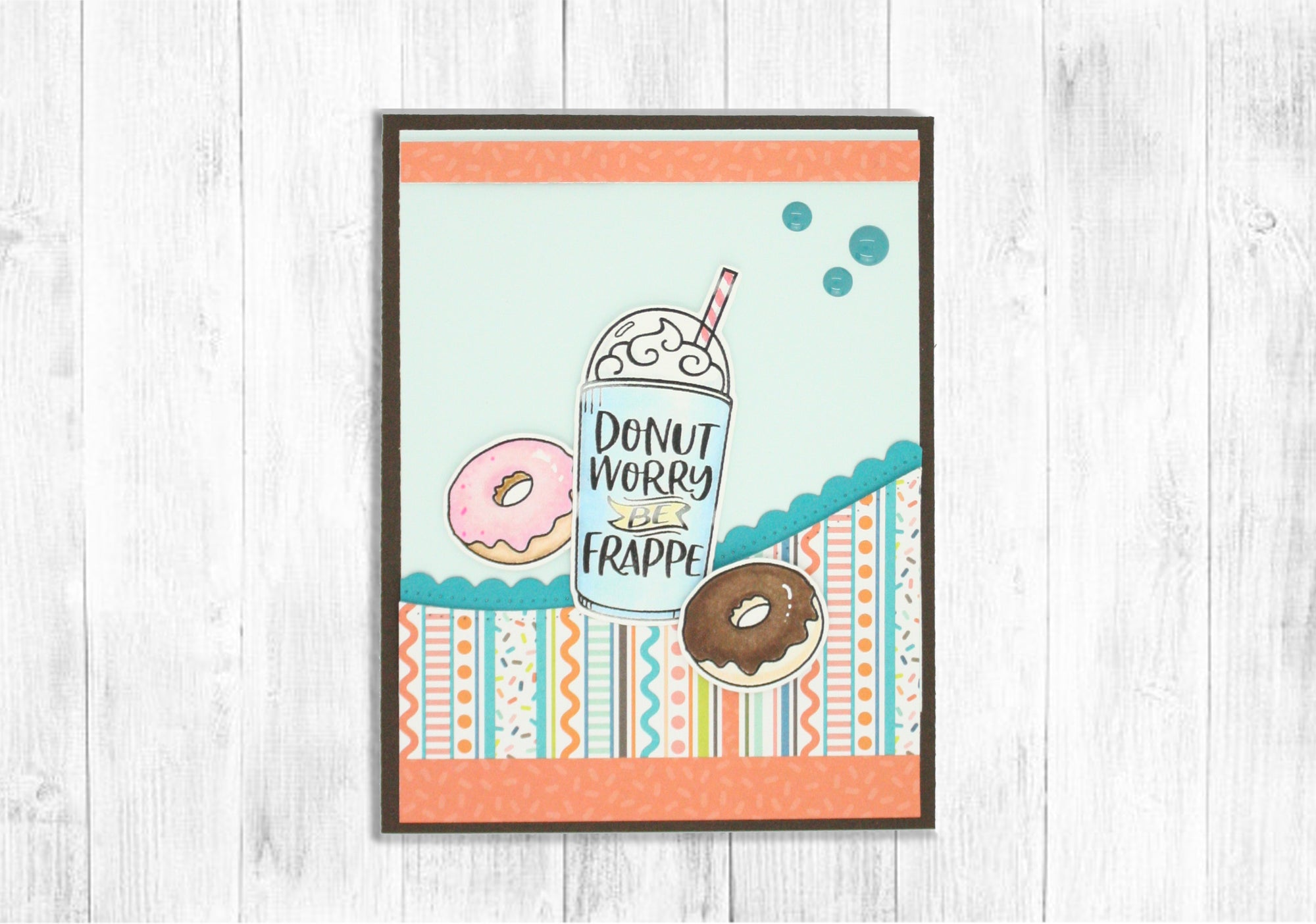 Handmade card using the stamp set, "Be Frappe" from Dare 2B Artzy.  Image of a frappe with two donuts and the sentiment, "Donut worry be frappe". 