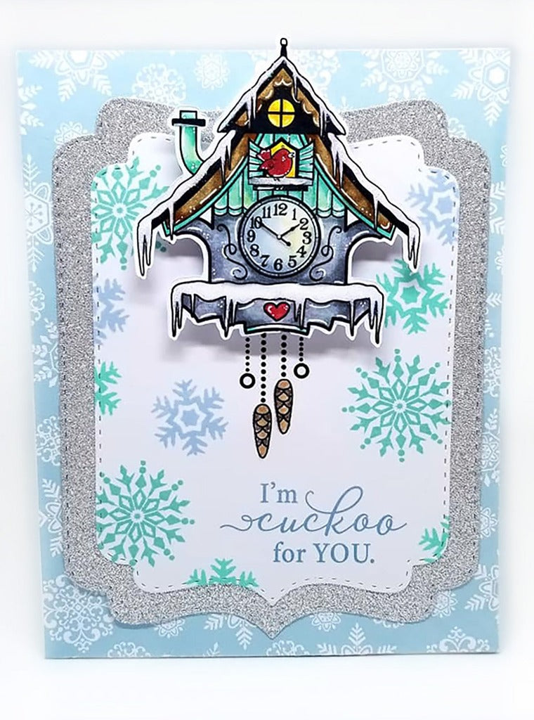 Time flies when you're making festive winter cards! The tiny soldier, deer, and tree can be die cut and set on the ledge of the clock for added whimsy.  This clear stamp set is made by Dare 2B Artzy.