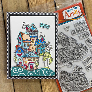 This whimsical stamp village makes a beautiful holiday card.  You will have so much fun coloring all the little details.  Made by Dare 2B Artzy. 